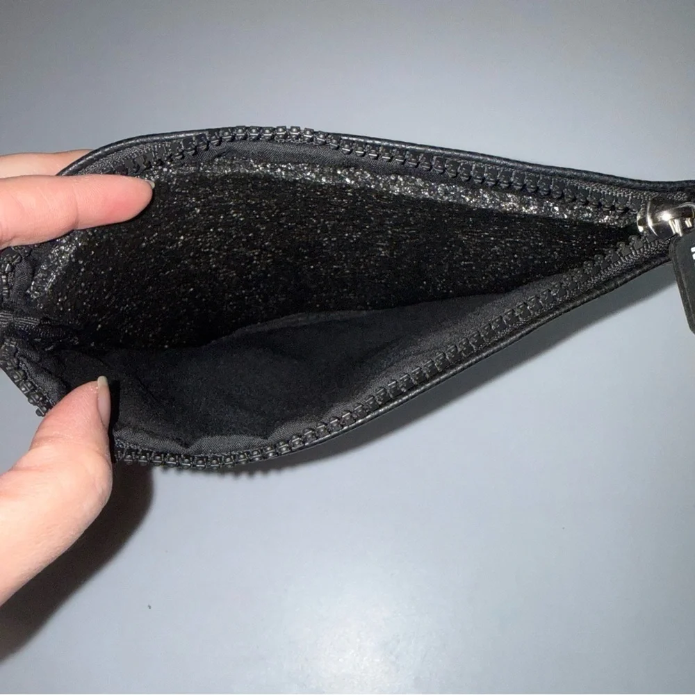 Nudestix Cosmetic Bag Black Pebbled Faux Leather Embroidery and lanyard